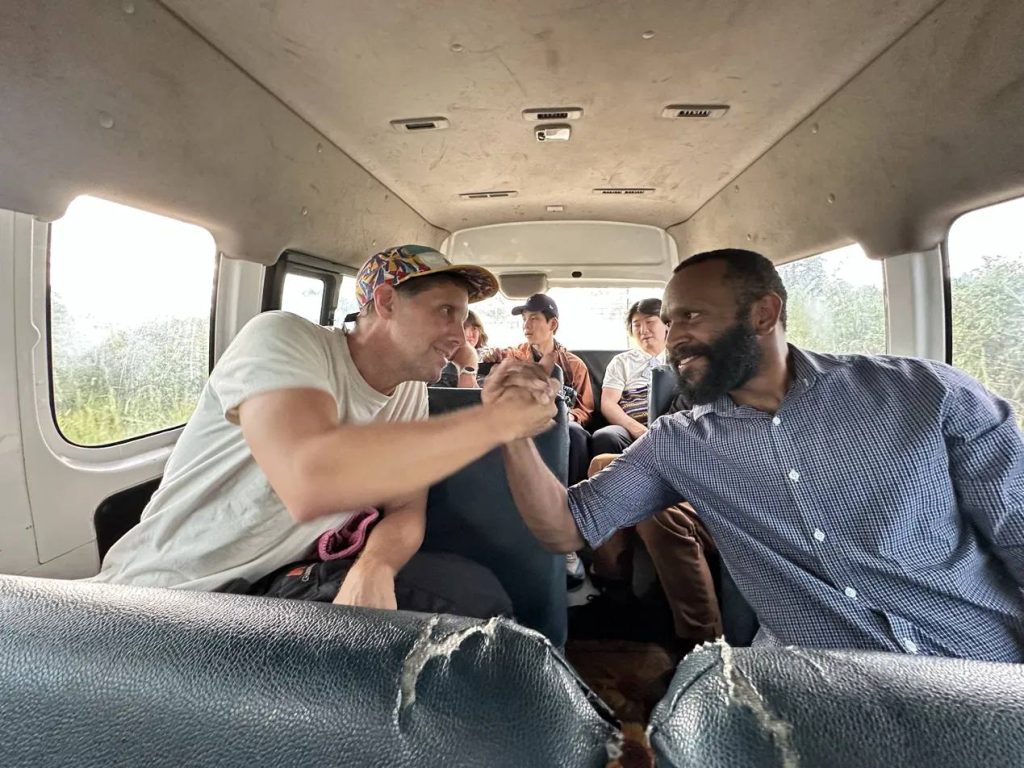 Vikram with a producer partner in Papua New Guinea